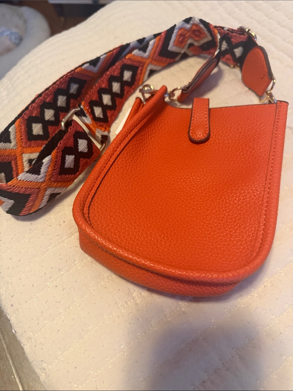 Orange Leather Crossbody Bag with Patterned Strap